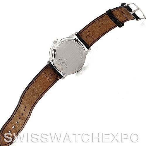 The image shows the back and strap of a De Ville model watch by Omega, viewed from a top-down angle.