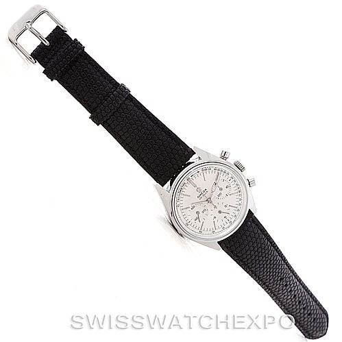 The image shows an Omega De Ville Men's Stainless Steel Silver Dial Men's Stainless Steel Silver Dial watch from a top-down angle, displaying the face, bezel, crown, pushers, and strap.