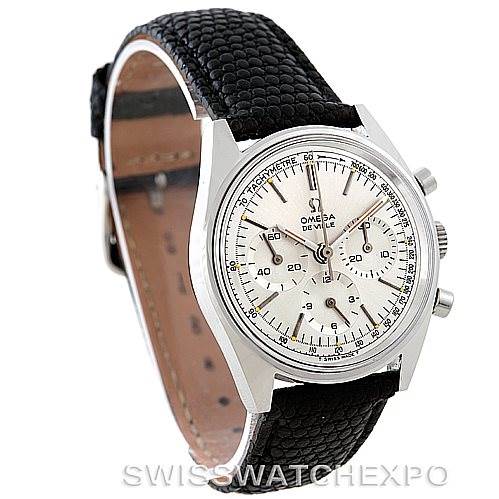 The image shows an Omega De Ville Men's Stainless Steel Silver Dial Men's Stainless Steel Silver Dial watch from a front-left angle, displaying its dial, bezel, and leather strap.