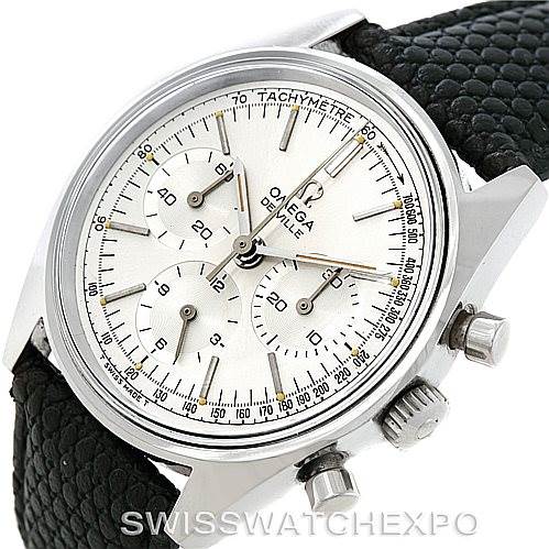 The image shows an Omega De Ville Men's Stainless Steel Silver Dial Men's Stainless Steel Silver Dial watch at an angled side view, highlighting its face, chronograph dials, crown, and textured black strap.