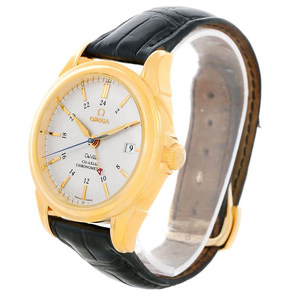The Omega De Ville 4633.30.31 Men's Yellow Gold Silver Dial 4633.30.31 Men's Yellow Gold Silver Dial watch is shown at a three-quarter angle, displaying the dial, case, crown, and black leather strap.