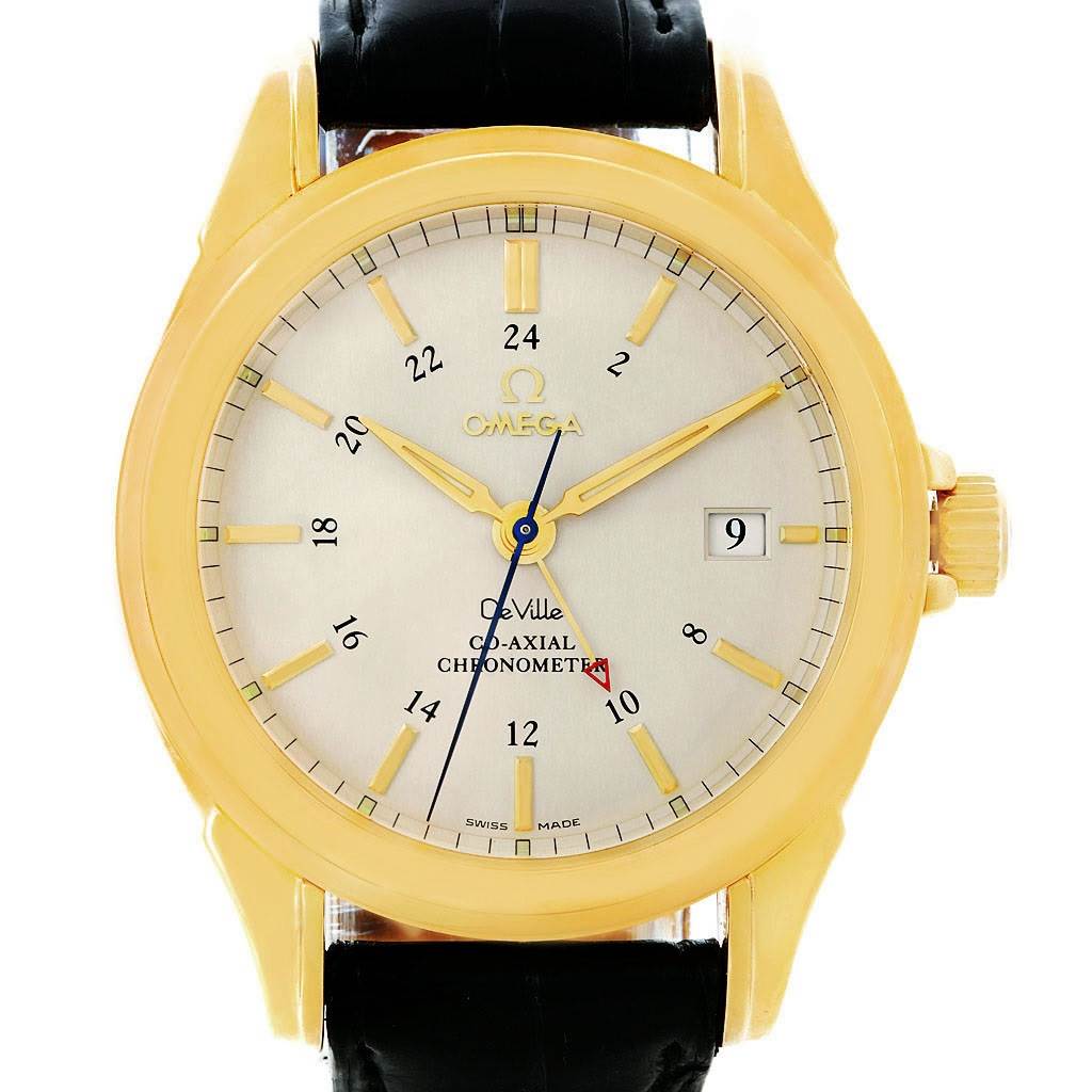 The Omega De Ville 4633.30.31 Men's Yellow Gold Silver Dial 4633.30.31 Men's Yellow Gold Silver Dial watch is shown from a front angle, showcasing its dial, hands, date window, and strap.