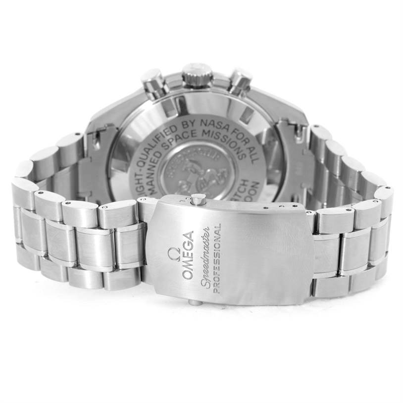 The image shows the back view of the Omega Speedmaster 311.30.42.30.01.005 Men
s Stainless Steel Black Dial 311.30.42.30.01.005 Men
s Stainless Steel Black Dial watch, focusing on the clasp and engraved case back.