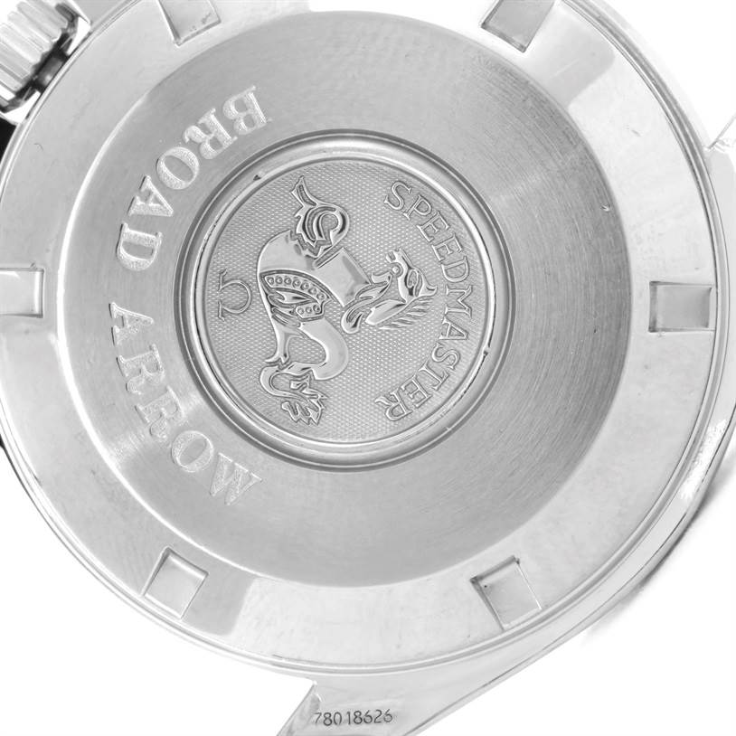 This image shows the case back of an Omega Speedmaster 3551.20.00 Men
s Stainless Steel White Dial 3551.20.00 Men
s Stainless Steel White Dial Broad Arrow watch with engraved text and emblem.