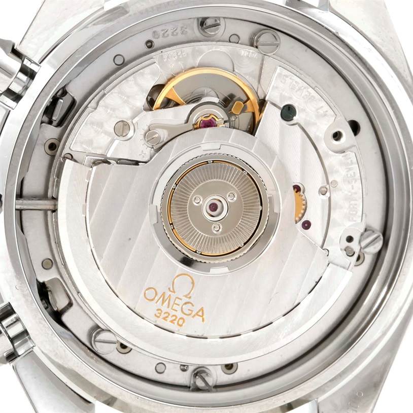 This image shows a close-up view of the movement mechanism inside an Omega Speedmaster 3539.50.00 Men
s Stainless Steel Black Dial 3539.50.00 Men
s Stainless Steel Black Dial watch.