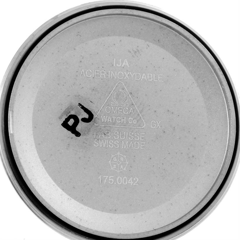 This image shows the inside case back of an Omega Speedmaster 3539.50.00 Men
s Stainless Steel Black Dial 3539.50.00 Men
s Stainless Steel Black Dial watch, highlighting its inscriptions and markings.