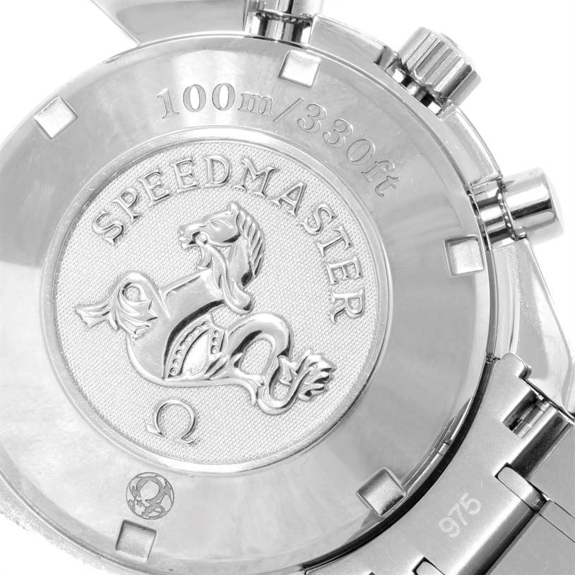 The image shows the back case and part of the bracelet of an Omega Speedmaster 323.10.40.40.02.001 Men
s Stainless Steel Silver Dial 323.10.40.40.02.001 Men
s Stainless Steel Silver Dial watch, highlighting the embossed logo and 100m/330ft marking.