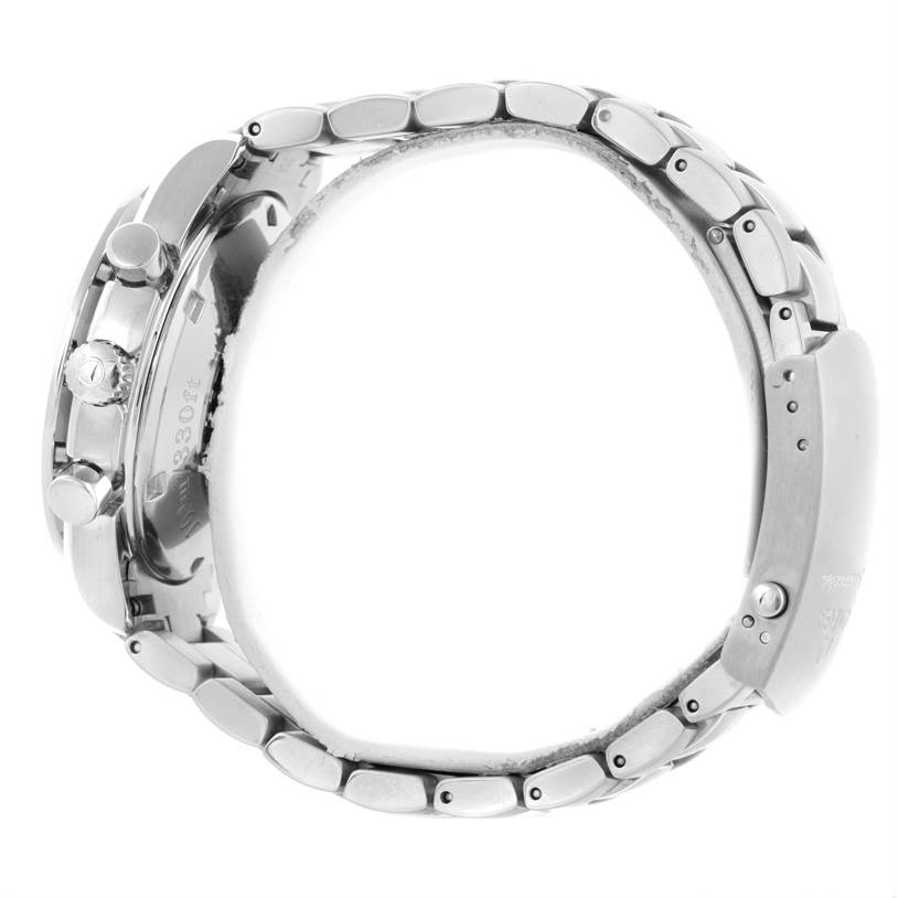 This image shows a side view of the Omega Speedmaster 3212.80.00 Men
s Stainless Steel Blue Dial 3212.80.00 Men
s Stainless Steel Blue Dial
s bracelet, case, crown, and pushers.