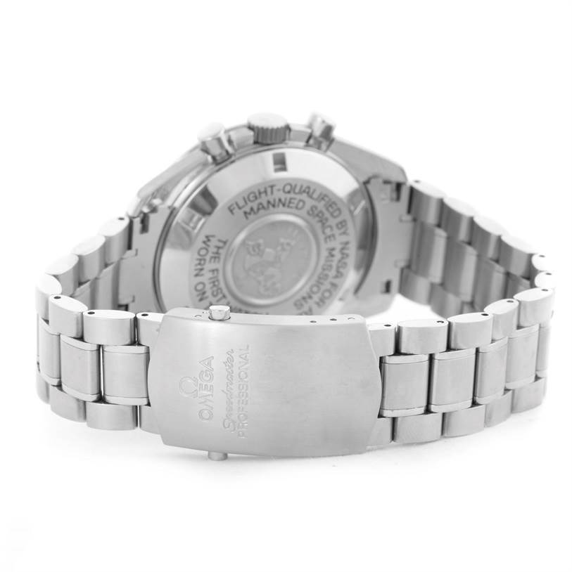 The image shows the back case and bracelet clasp of an Omega Speedmaster 3575.30.00 Men
s Stainless Steel Silver Dial 3575.30.00 Men
s Stainless Steel Silver Dial watch from a rear angle.