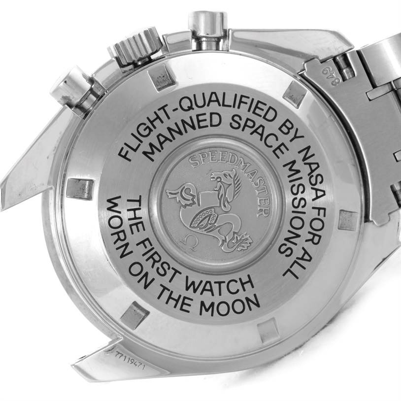 The image shows the back case of an Omega Speedmaster 3575.30.00 Men
s Stainless Steel Silver Dial 3575.30.00 Men
s Stainless Steel Silver Dial watch, highlighting its engravings and metal bracelet.