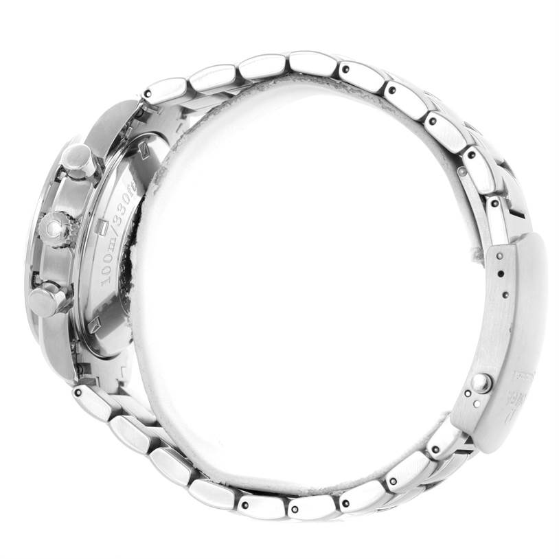 The image shows the side view of an Omega Speedmaster 3220.50.00 Men
s Stainless Steel Black Dial 3220.50.00 Men
s Stainless Steel Black Dial watch, highlighting its case, push-buttons, and part of the bracelet and clasp.