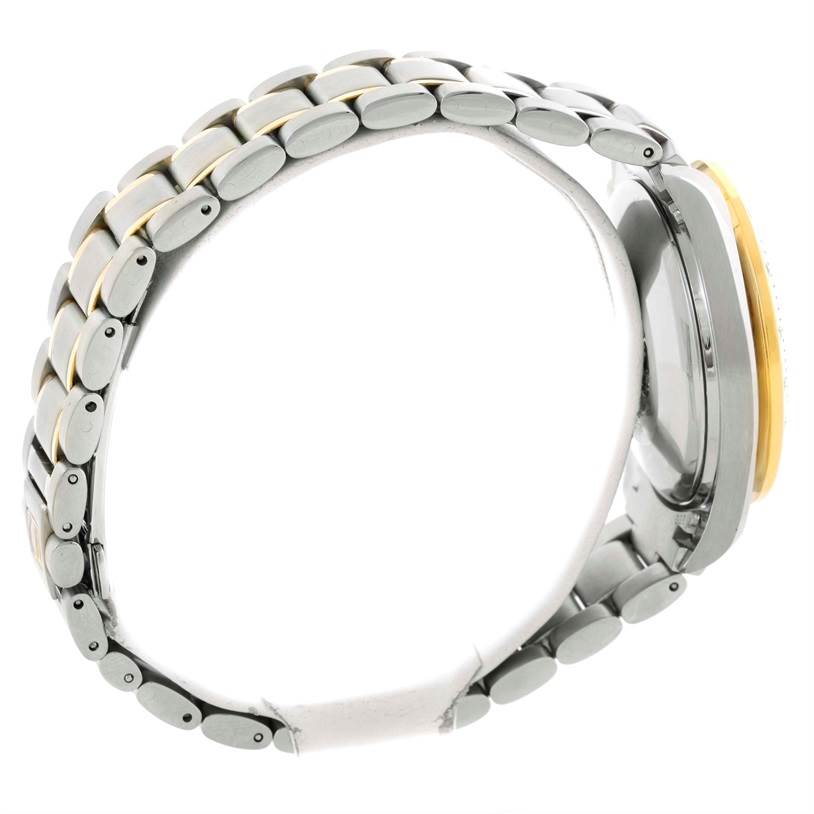 The image shows a side view of the Omega Speedmaster 3313.50.00 Men's Steel and Gold (two tone) Black Dial 3313.50.00 Men's Steel and Gold (two tone) Black Dial's metal bracelet and partially visible case.