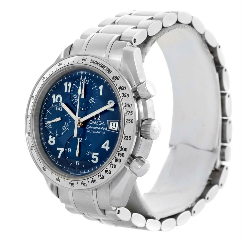 The Omega Speedmaster Men
s Stainless Steel Blue Dial Men
s Stainless Steel Blue Dial watch is shown at a three-quarters angle, highlighting its blue dial, tachymeter bezel, and stainless steel bracelet.