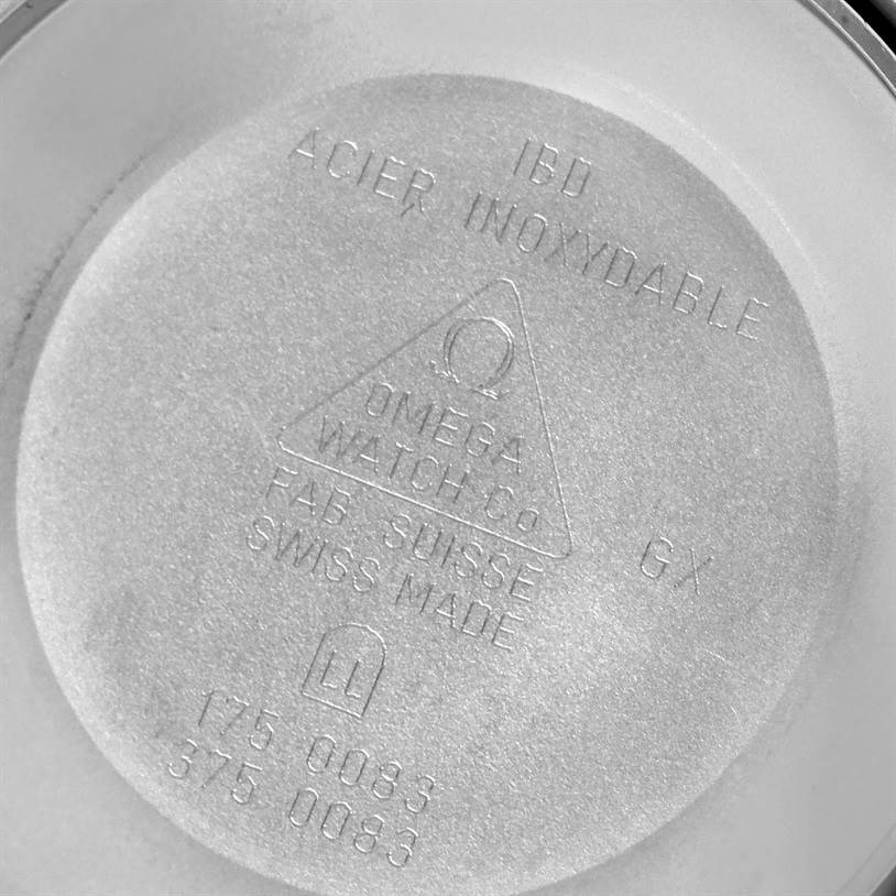 This image shows the inner case back of an Omega Speedmaster 3313.33.00 Men's Steel and Gold (two tone) White Dial 3313.33.00 Men's Steel and Gold (two tone) White Dial watch, indicating the material and manufacturing details.