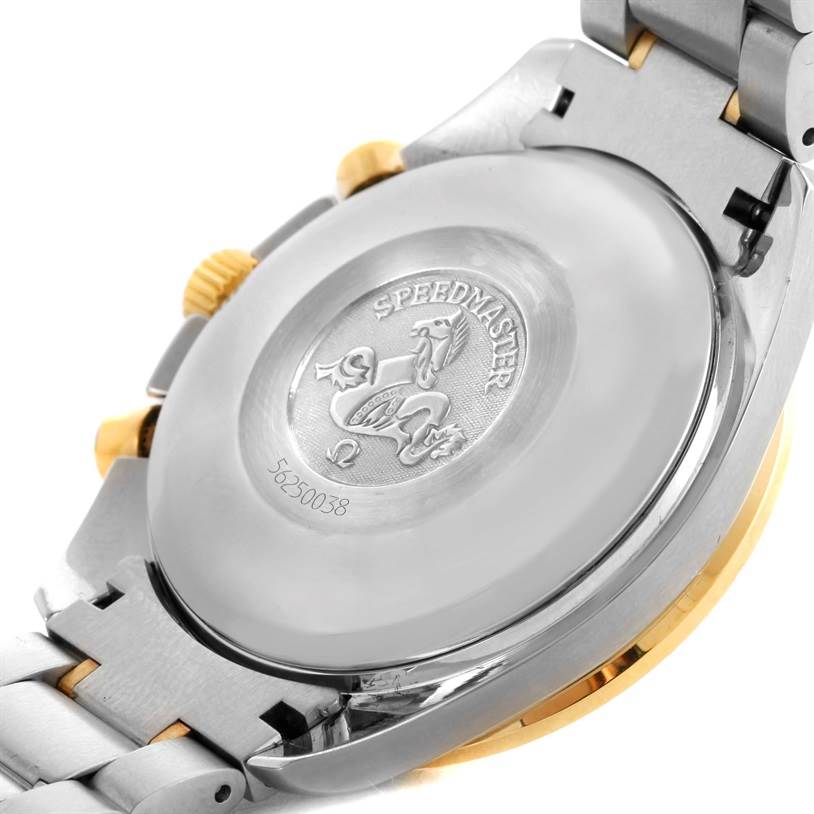 This image shows the back case and part of the bracelet of the Omega Speedmaster 3313.33.00 Men's Steel and Gold (two tone) White Dial 3313.33.00 Men's Steel and Gold (two tone) White Dial watch, featuring the model engraving.