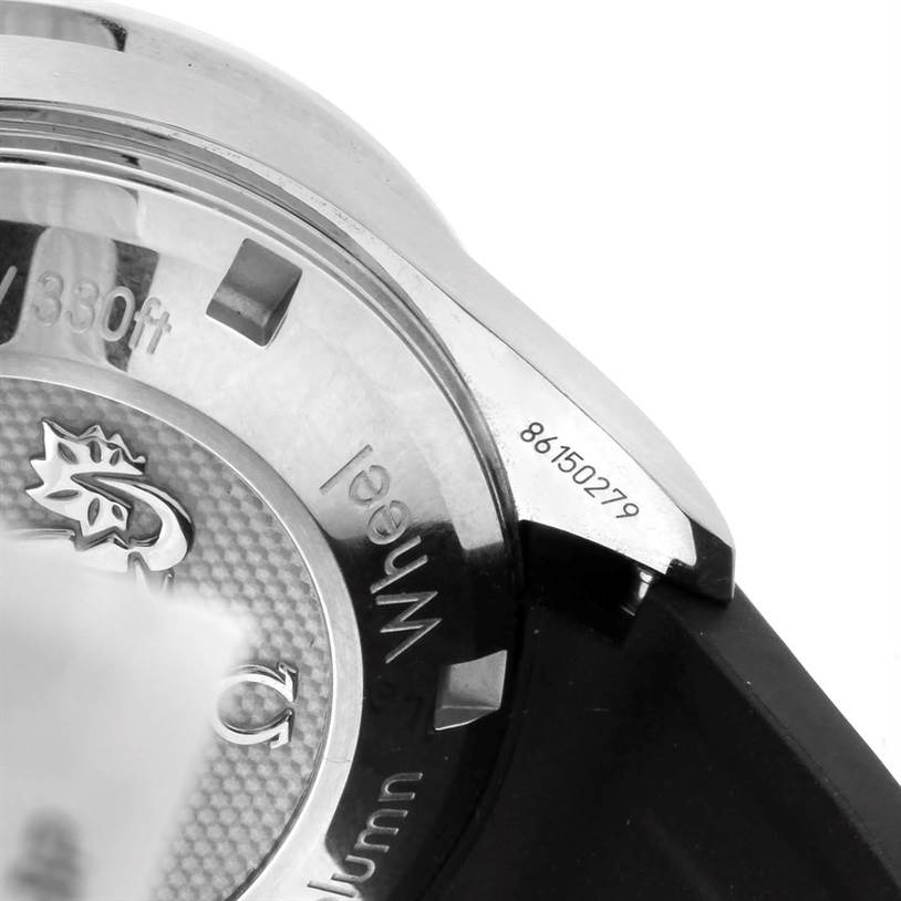 The image shows the back of the Omega Speedmaster 326.32.40.50.06.001 Men
s Stainless Steel Grey Dial 326.32.40.50.06.001 Men
s Stainless Steel Grey Dial watch, highlighting the case and some engraved details.