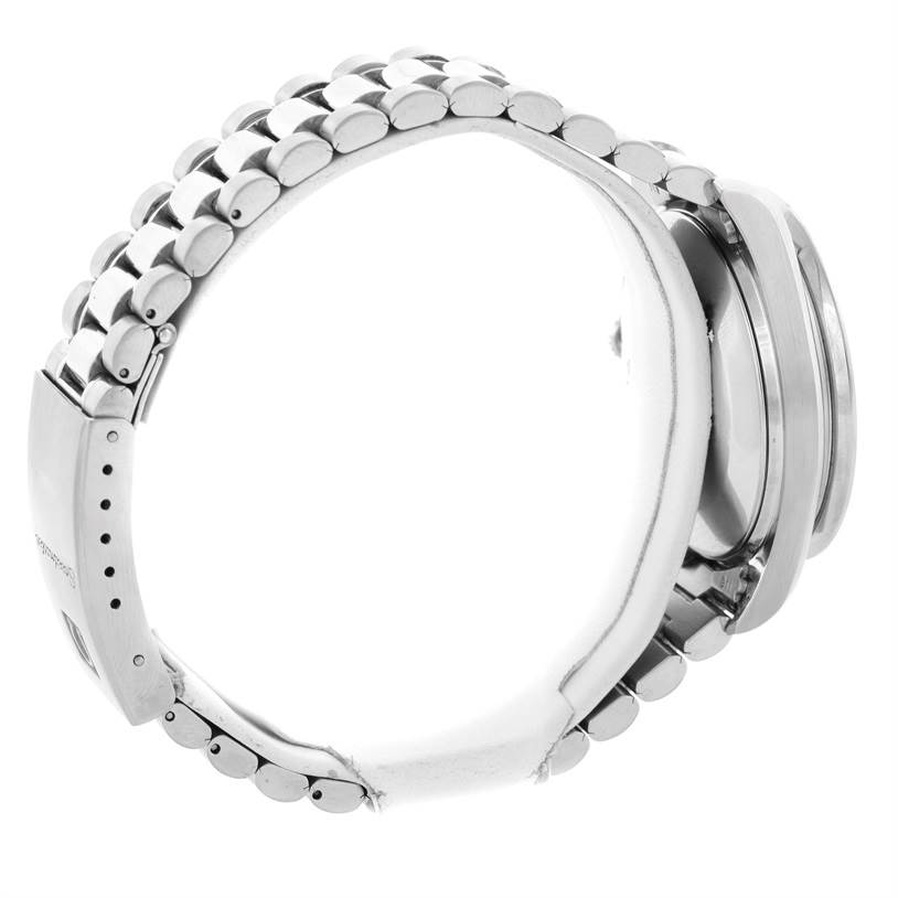 The image shows the side profile of an Omega Speedmaster 3510.50.00 Men
s Stainless Steel Black Dial 3510.50.00 Men
s Stainless Steel Black Dial watch, highlighting the metal bracelet and clasp.