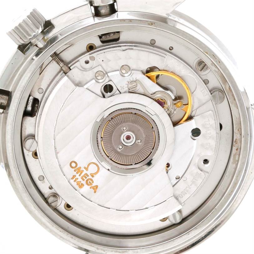 This is a close-up view of the Omega Speedmaster 3510.50.00 Men
s Stainless Steel Black Dial 3510.50.00 Men
s Stainless Steel Black Dial watch movement, showing intricate mechanical parts.