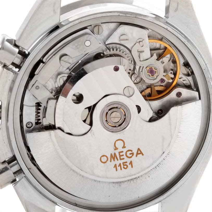 The image shows the back of an Omega Speedmaster 3523.80.00 Men
s Stainless Steel Blue Dial 3523.80.00 Men
s Stainless Steel Blue Dial watch, revealing its internal mechanical movement and parts.