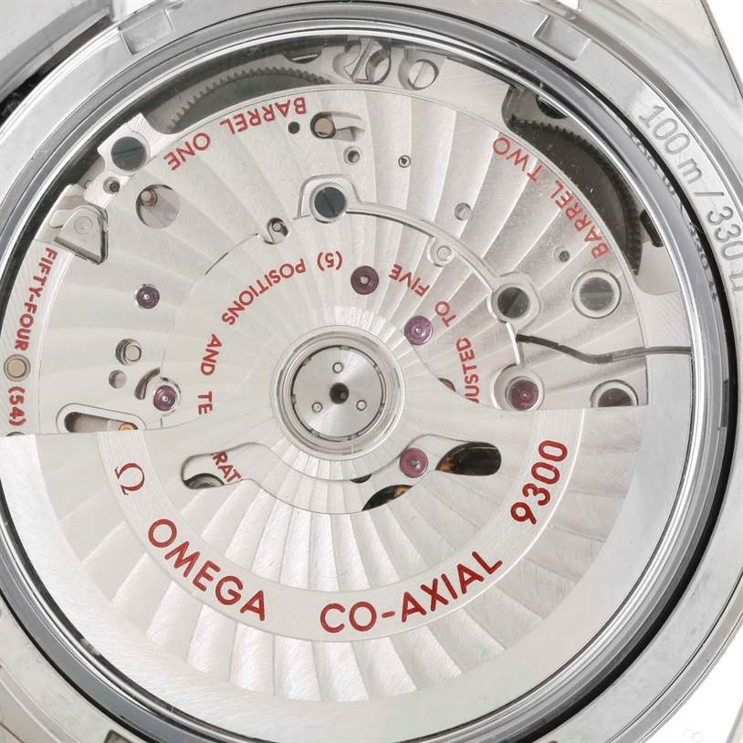 The image shows a close-up view of the movement and rotor of the Omega Speedmaster 311.30.44.51.01.002 Stainless Steel Black Dial 311.30.44.51.01.002 Stainless Steel Black Dial Co-Axial Caliber 9300.