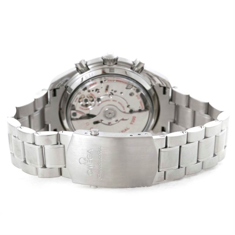 The image shows the back view of an Omega Speedmaster 311.30.44.51.01.002 Stainless Steel Black Dial 311.30.44.51.01.002 Stainless Steel Black Dial watch, highlighting its open case back and metal bracelet with clasp.