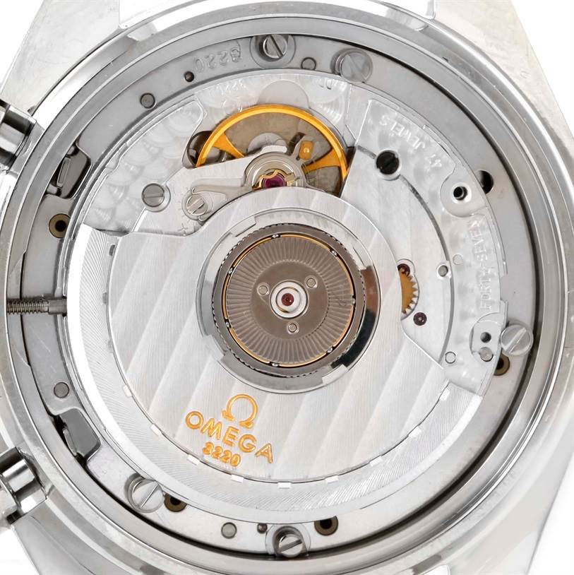 This image shows the back view of the Omega Speedmaster 3510.50.00 Men
s Stainless Steel Black Dial 3510.50.00 Men
s Stainless Steel Black Dial, specifically its exposed movement and internal mechanism.