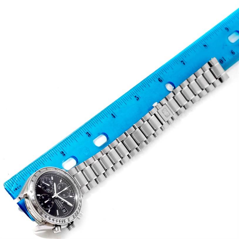 The image shows an Omega Speedmaster 3513.50.00 Men
s Stainless Steel Black Dial 3513.50.00 Men
s Stainless Steel Black Dial watch, focusing on the face and bracelet, with a ruler for scale.