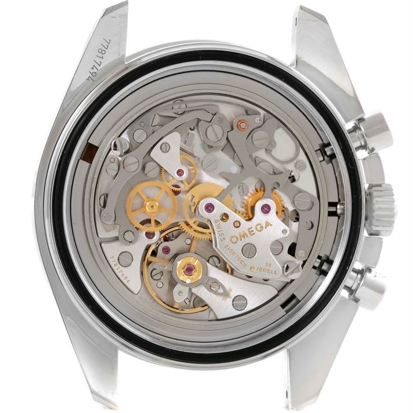 The image shows a close-up view of the movement and internal mechanism of the Omega Speedmaster 311.30.42.30.01.005 Men
s Stainless Steel Black Dial 311.30.42.30.01.005 Men
s Stainless Steel Black Dial watch from the rear.