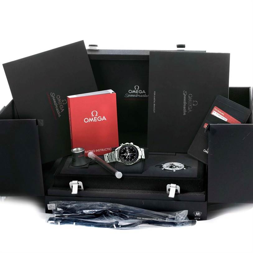 The Omega Speedmaster 311.30.42.30.01.005 Men
s Stainless Steel Black Dial 311.30.42.30.01.005 Men
s Stainless Steel Black Dial watch and its accessories are displayed at a straight-on angle, including manuals, a strap, and tools.