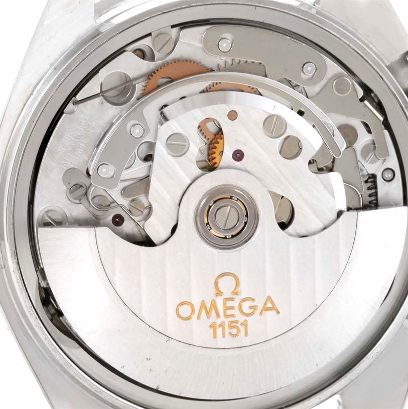 The image shows the movement and internal mechanism of an Omega Speedmaster 3521.30.00 Men
s Stainless Steel Silver Dial 3521.30.00 Men
s Stainless Steel Silver Dial model from the back.