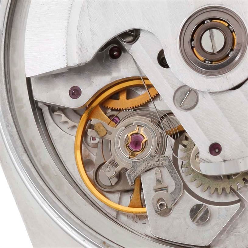 This image shows a close-up view of the internal mechanical parts of the Omega Speedmaster 3513.50.00 Men
s Stainless Steel Black Dial 3513.50.00 Men
s Stainless Steel Black Dial watch movement.