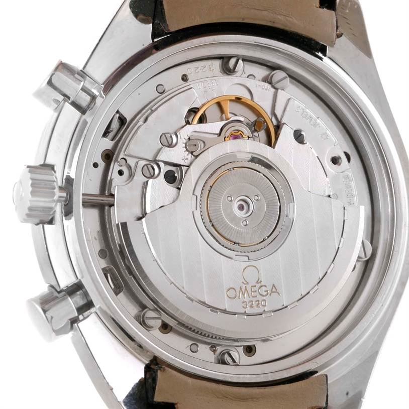 The image shows the back view of an Omega Speedmaster 3510.50.00 Men
s Stainless Steel Black Dial 3510.50.00 Men
s Stainless Steel Black Dial watch, highlighting its exposed movement and intricate inner mechanics.