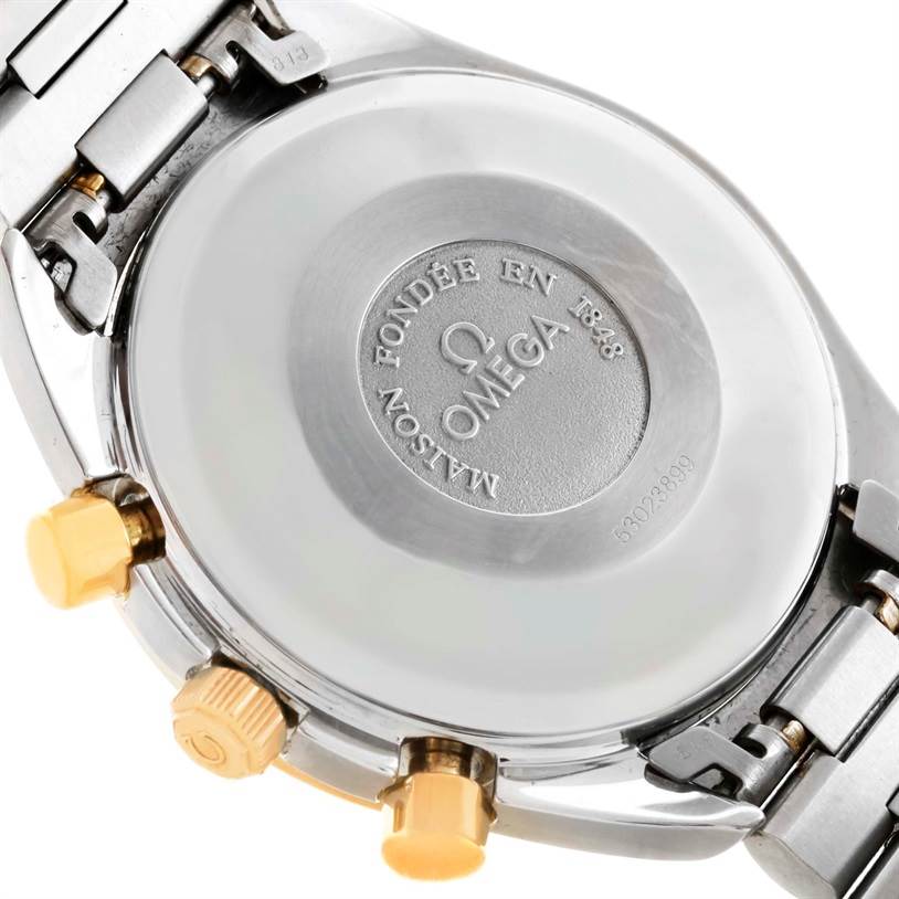 The image shows the back case and parts of the bracelet of an Omega Speedmaster 3330.20.00 Men
s Stainless Steel White Dial 3330.20.00 Men
s Stainless Steel White Dial watch.