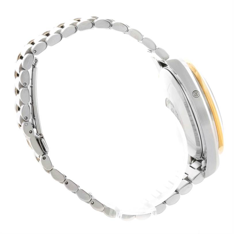 The image shows a side view of the Omega Speedmaster 3330.20.00 Men
s Stainless Steel White Dial 3330.20.00 Men
s Stainless Steel White Dial watch displaying its bracelet, clasp, and side of the case.