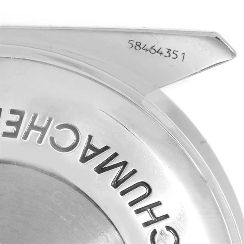 The image shows the back cover of an Omega Speedmaster 3529.50.00 Men
s Stainless Steel Black Dial 3529.50.00 Men
s Stainless Steel Black Dial watch, highlighting part of the branding and a serial number.