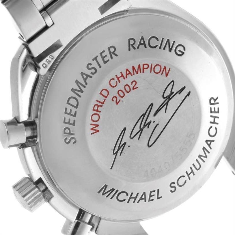 This image shows the back case of an Omega Speedmaster 3529.50.00 Men
s Stainless Steel Black Dial 3529.50.00 Men
s Stainless Steel Black Dial Racing watch, featuring an engraving commemorating a 2002 World Champion.