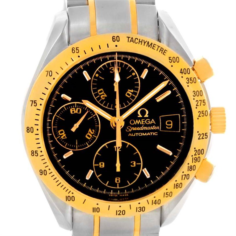 The image shows a front view of an Omega Speedmaster watch, highlighting the dial, tachymeter, chronograph subdials, and date display.