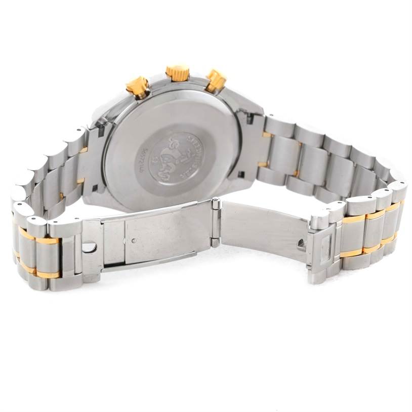 The image shows the back and bracelet of an Omega Speedmaster 3313.50.00 Men's Steel and Gold (two tone) Black Dial 3313.50.00 Men's Steel and Gold (two tone) Black Dial watch, featuring a two-tone metal design with a closed clasp.