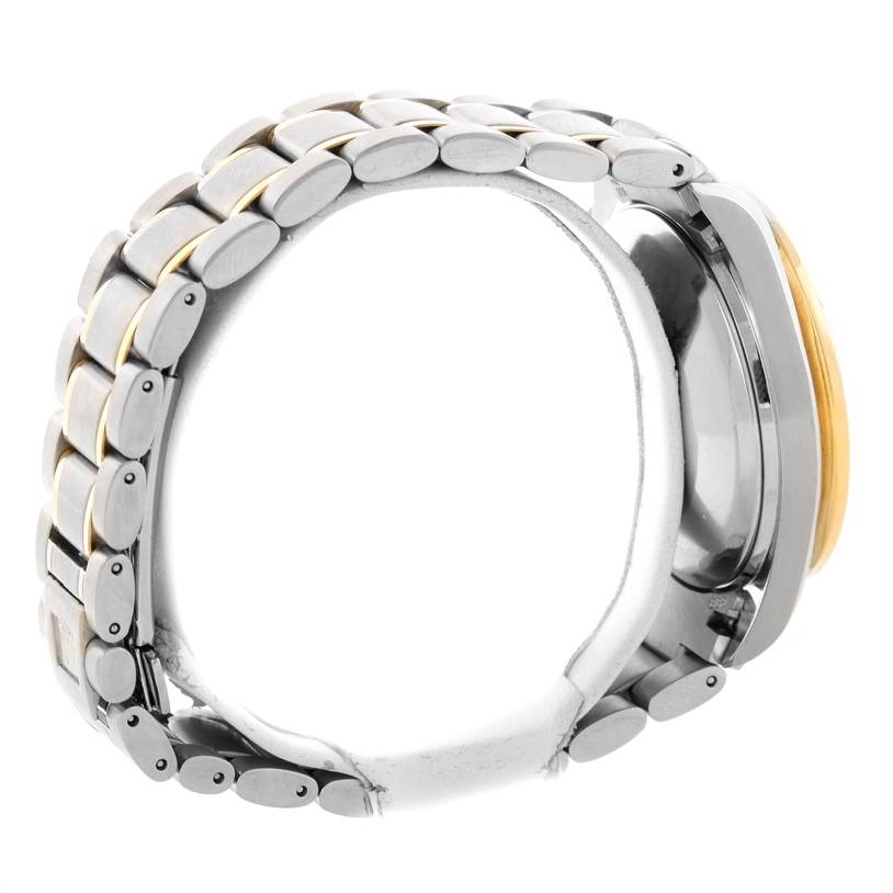 The image shows a side view of an Omega Speedmaster 3313.50.00 Men's Steel and Gold (two tone) Black Dial 3313.50.00 Men's Steel and Gold (two tone) Black Dial watch focusing on its metallic bracelet and partial case.