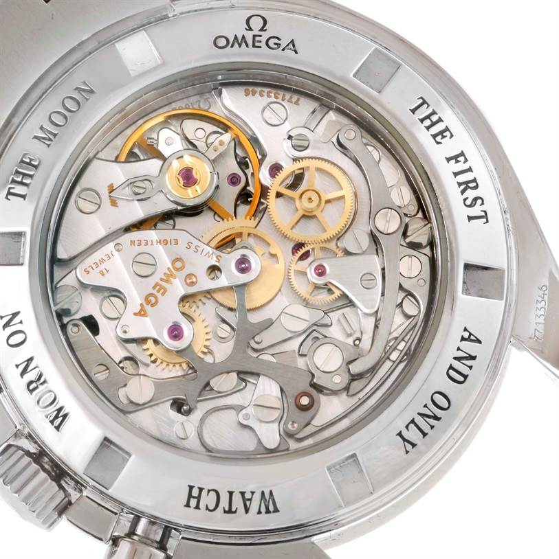 The image shows the back view of the Omega Speedmaster 3573.50.00 Men
s Stainless Steel Black Dial 3573.50.00 Men
s Stainless Steel Black Dial, displaying its intricate mechanical movement.