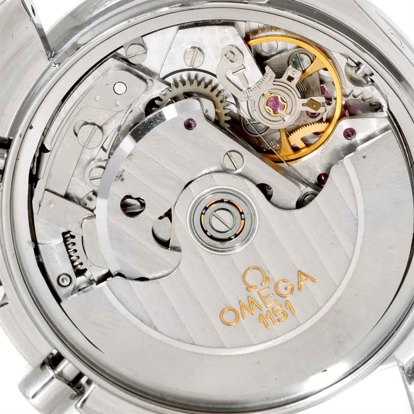 The image shows a detailed view of the movement and inner mechanisms of the Omega Speedmaster 3529.50.00 Men
s Stainless Steel Black Dial 3529.50.00 Men
s Stainless Steel Black Dial watch.