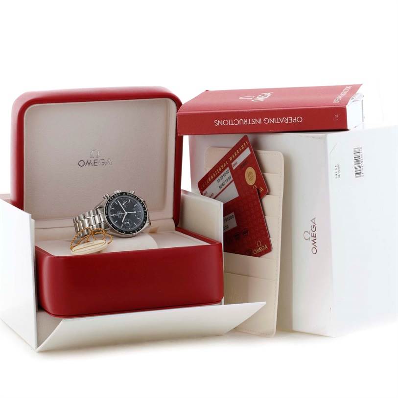 This Omega Speedmaster 3539.50.00 Men
s Stainless Steel Black Dial 3539.50.00 Men
s Stainless Steel Black Dial watch is shown in its open box at an angle, along with its warranty cards and operating instructions.