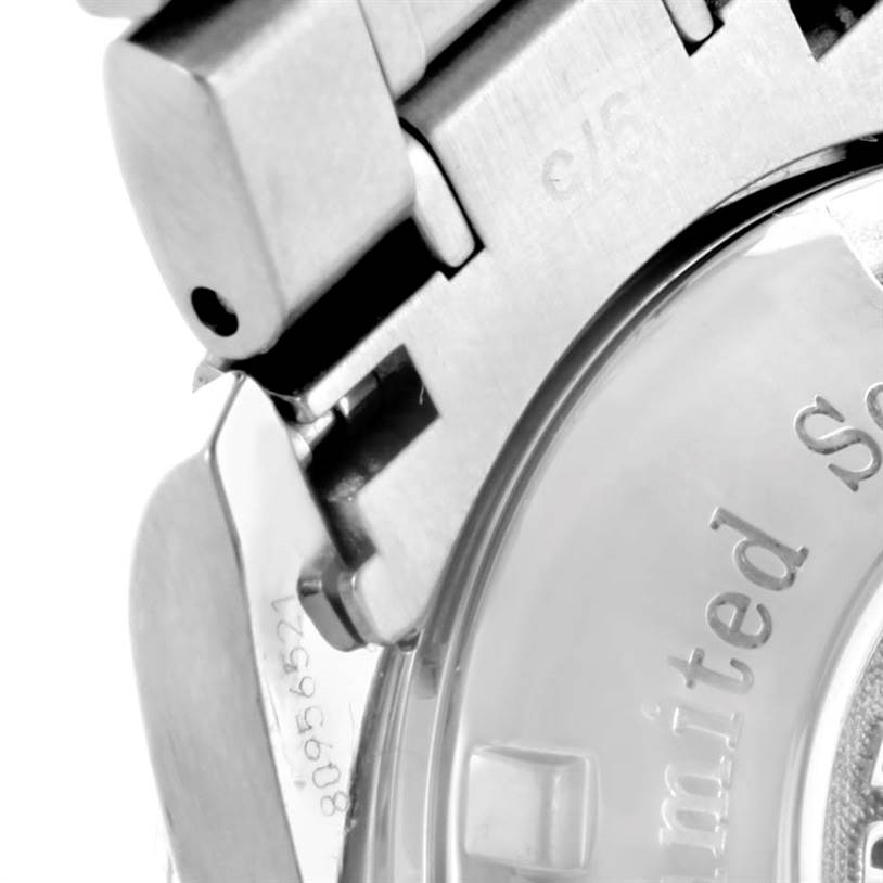 The image shows a close-up view of the clasp and part of the case back of an Omega Speedmaster 323.30.40.40.01.001 Men
s Stainless Steel Black Dial 323.30.40.40.01.001 Men
s Stainless Steel Black Dial watch.