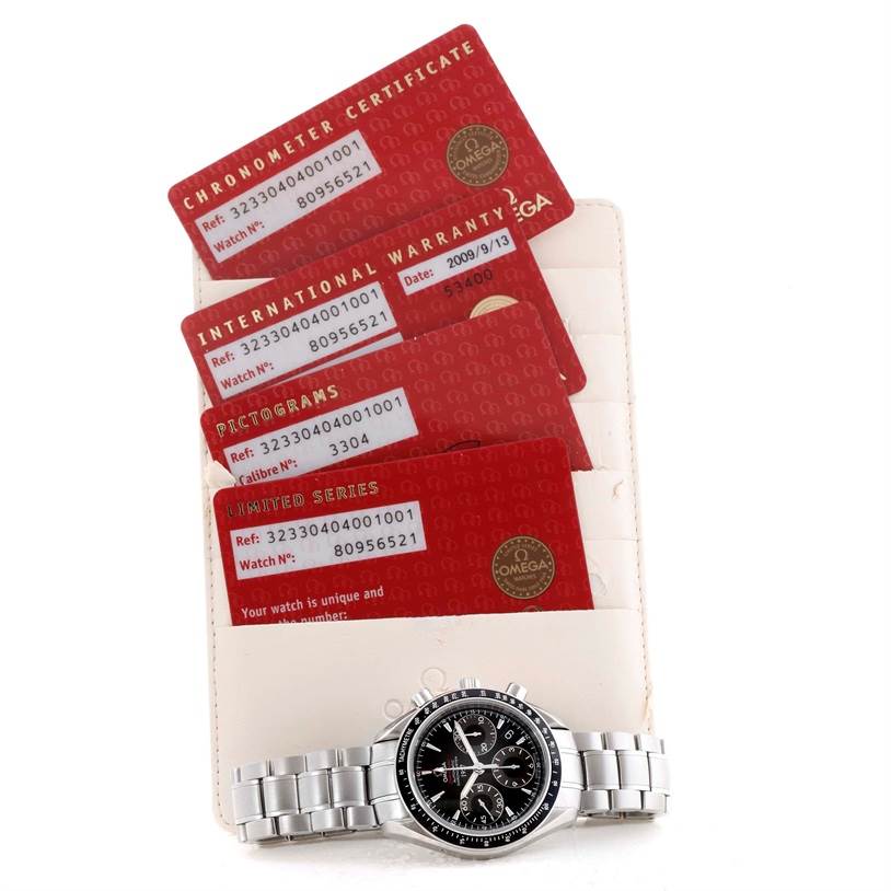 The image shows an Omega Speedmaster 323.30.40.40.01.001 Men
s Stainless Steel Black Dial 323.30.40.40.01.001 Men
s Stainless Steel Black Dial watch with its bracelet and warranty cards, indicating its certification and Best Quality
ity.