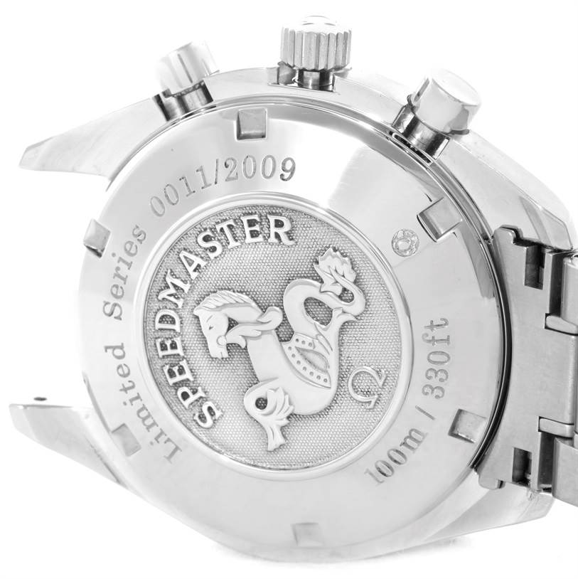 The image shows the back of the Omega Speedmaster 323.30.40.40.01.001 Men
s Stainless Steel Black Dial 323.30.40.40.01.001 Men
s Stainless Steel Black Dial watch, featuring a limited series engraving and the brand
s emblem.