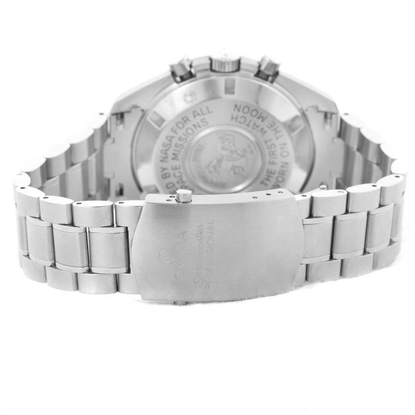 The image shows the back case and metal bracelet clasp of an Omega Speedmaster 3570.50.00 Men
s Stainless Steel Black Dial 3570.50.00 Men
s Stainless Steel Black Dial watch, focusing on the engraving details.