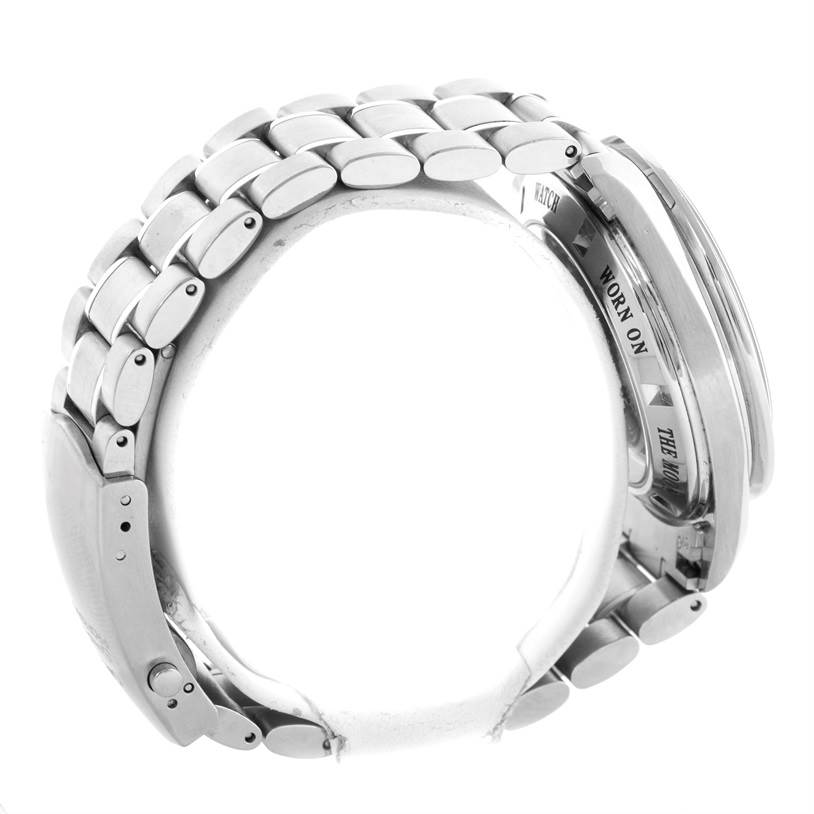 The image shows a side view of an Omega Speedmaster 3573.50.00 Men
s Stainless Steel Black Dial 3573.50.00 Men
s Stainless Steel Black Dial watch, highlighting its metal bracelet and partially visible case back.