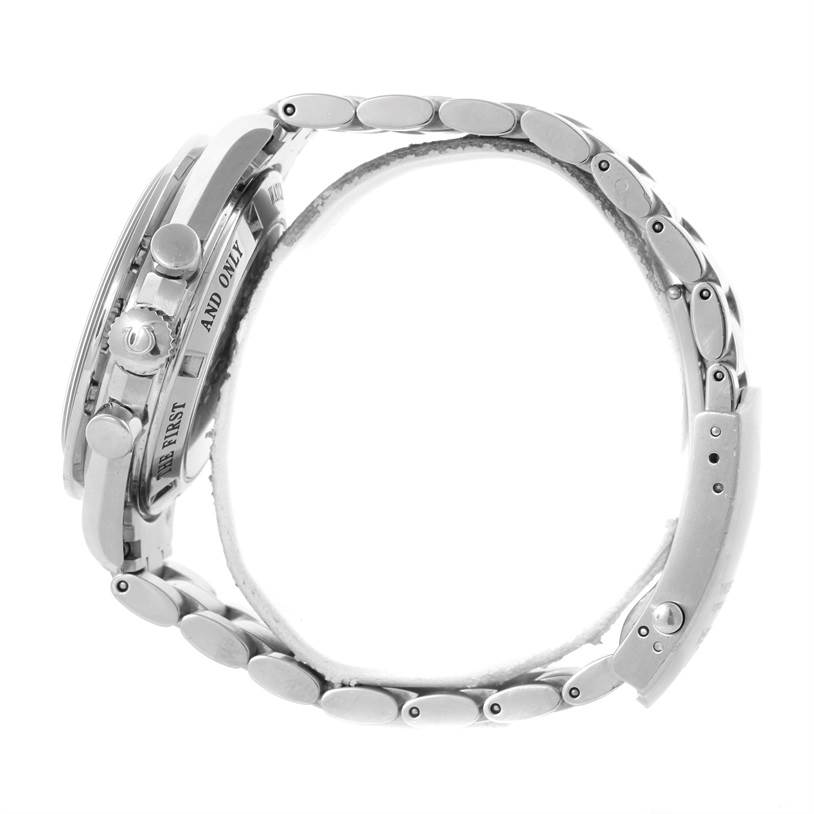 The image shows a side view of the Omega Speedmaster 3573.50.00 Men
s Stainless Steel Black Dial 3573.50.00 Men
s Stainless Steel Black Dial watch, highlighting its case, bezel, pushers, crown, and metal bracelet.