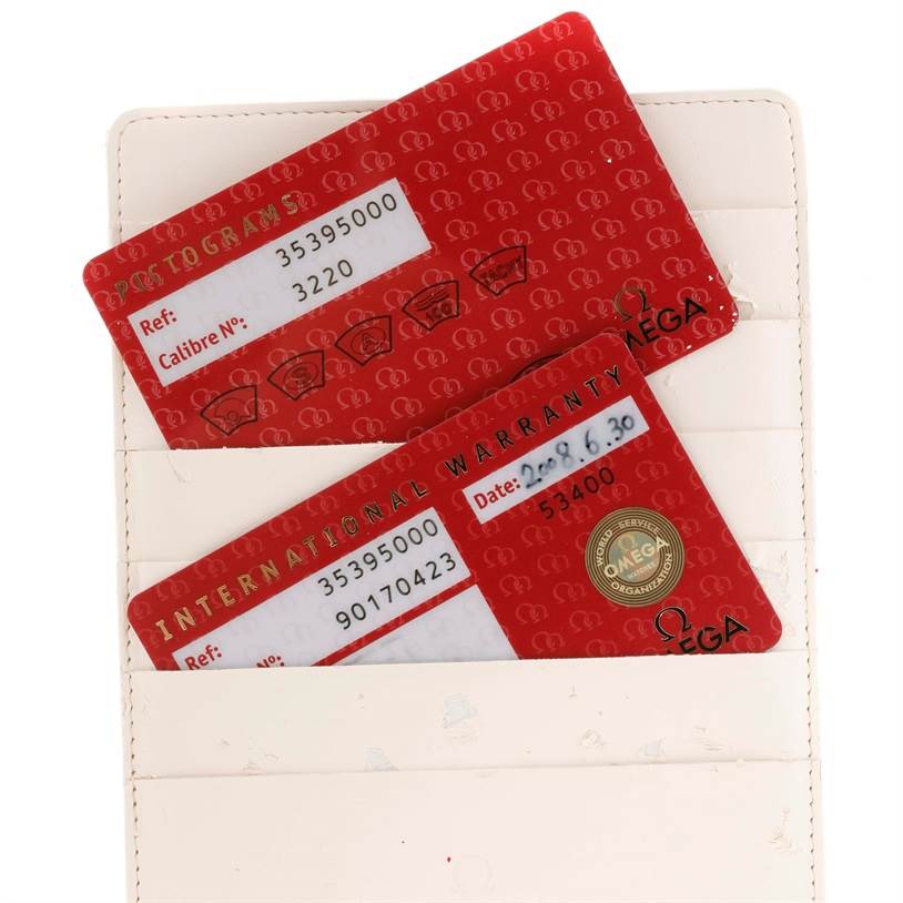 The image shows warranty and pictogram cards for the Omega Speedmaster 3539.50.00 Men
s Stainless Steel Black Dial 3539.50.00 Men
s Stainless Steel Black Dial, placed in a card holder.