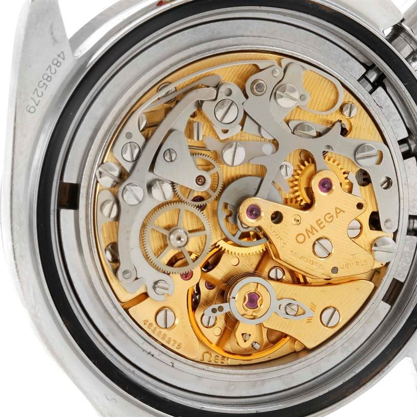 The image shows the intricate mechanical movement of an Omega Speedmaster Men
s Stainless Steel Black Dial Men
s Stainless Steel Black Dial watch, captured from the back.